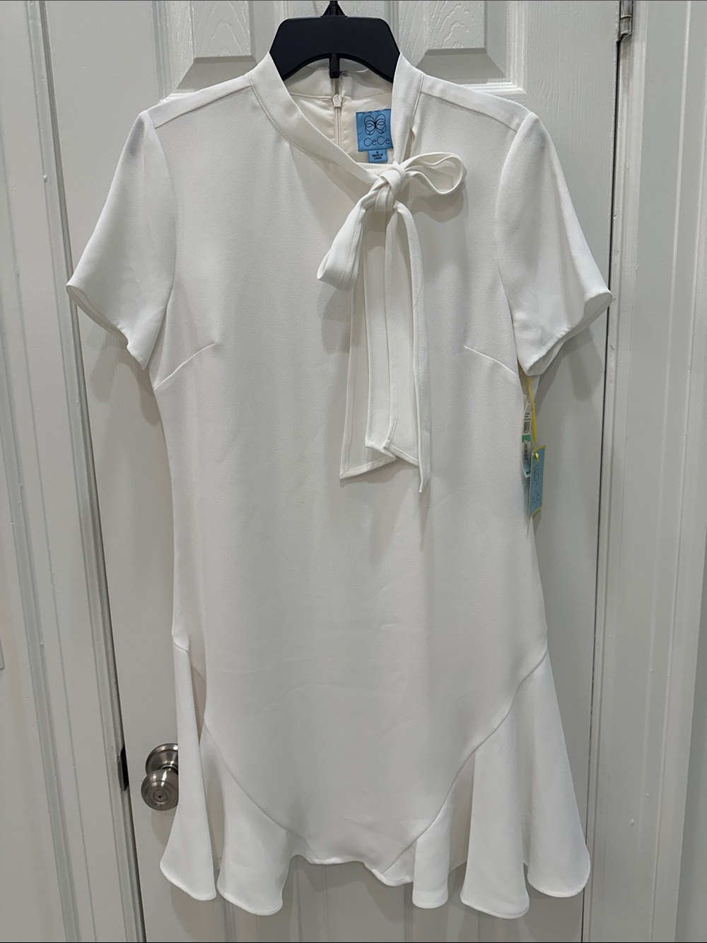 CeCe Ivory Tie-Neck Ruffle Hem Dress